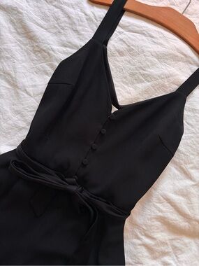 Aritzia Classic Black Sleeveless Jumpsuit with Front Buttons